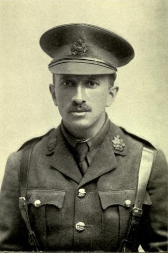 Bernard Pitt in his British Military uniform. He is wearing a peaked cap and a jacket with brass buttons and two breast pockets.