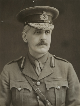 Sir Fabian Ware wearing a British officer's uniform complete with peaked cap.
