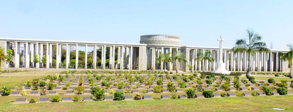 The Rangoon Memorial featuring multiple columned wings extending from a central rotunda.