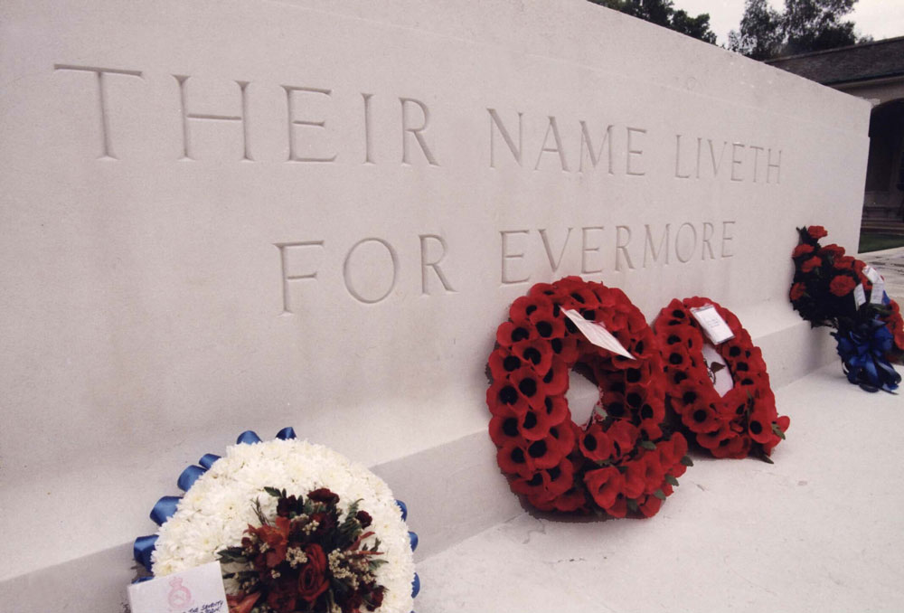 A close up of the Stone of Remembrance featuring the inscription "Their Name Liveth For Evermore".