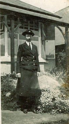 Petty Officer Victoria Ellen Whitehall outside a naval college building in her WRNS uniform