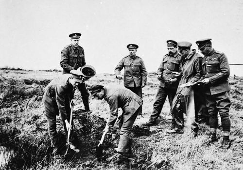 Graves Registration Unit team search for remains on the former battlefield c. 1920. The Goodland Collection © CWGC