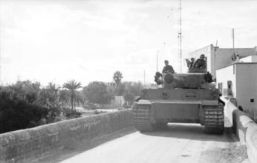 A tiger tank on the prowl in a Tunisian village