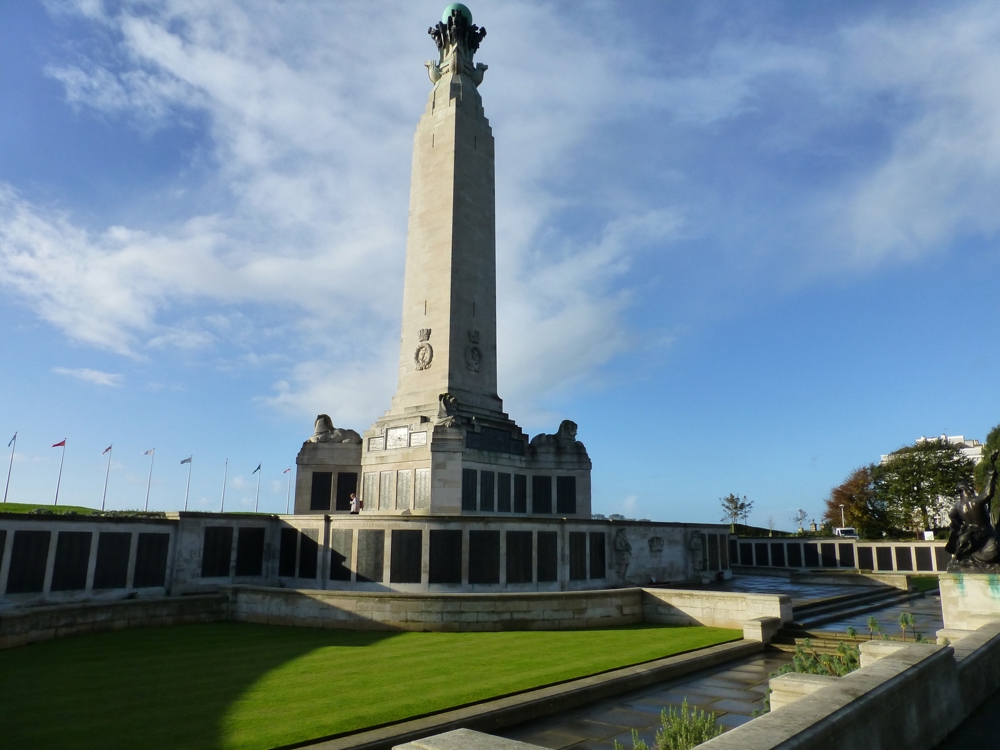 Plymouth Naval Memorial silhouetted against a blue sky