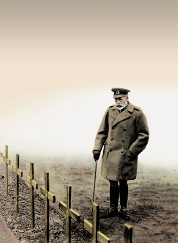 A colourised photo of King George V observing war graves.