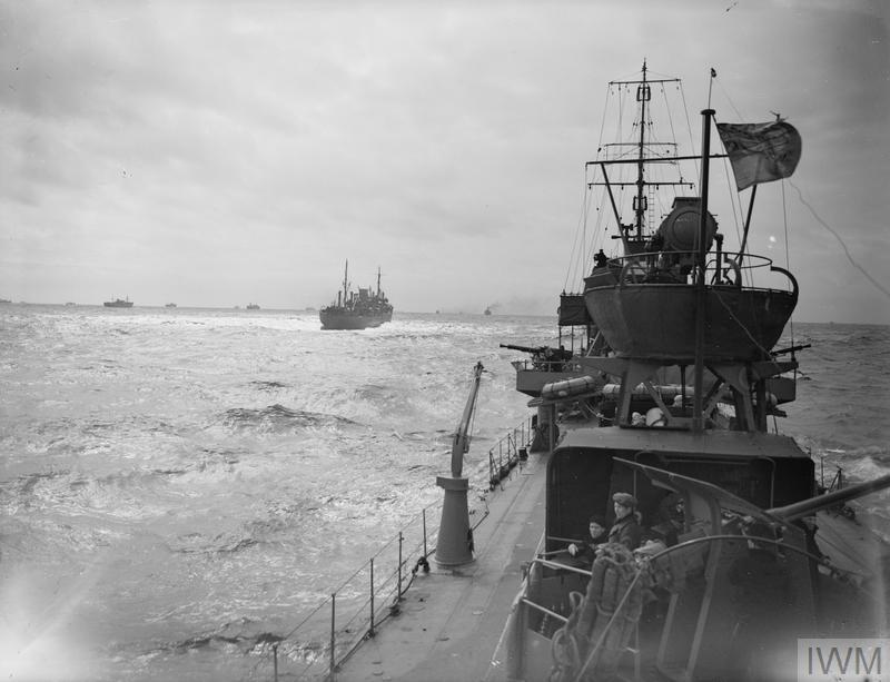 WW2 era Royal Navy shops crossing the Atlantic taking from the deck of a Destroyer.