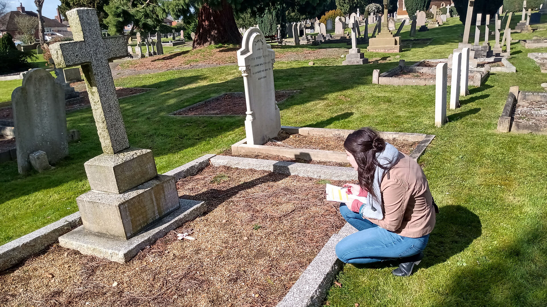 Air cadets studying CWGC headstone