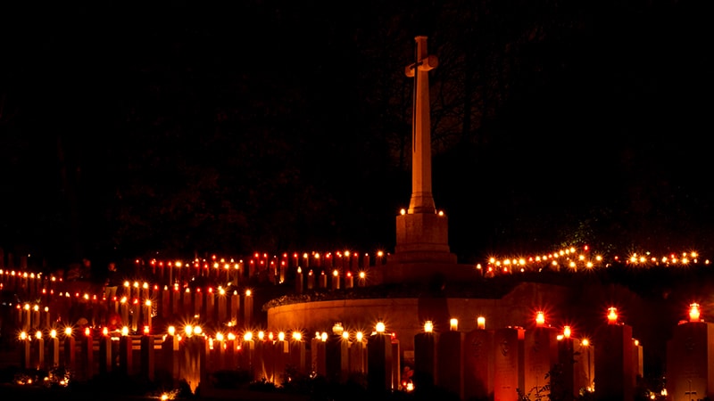 Poznan Old Garrison Cemetery lit by candlelight