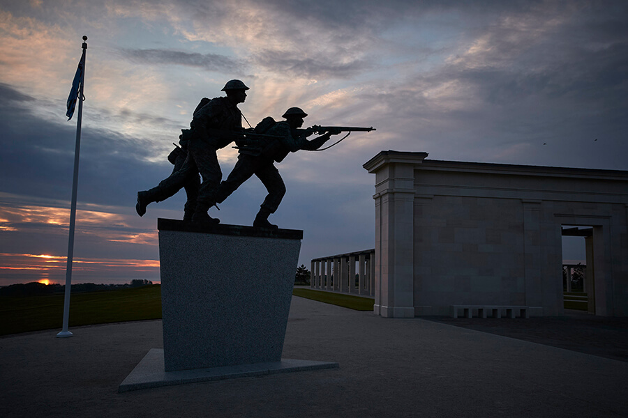 Statues at dusk at the Normandy Memorial